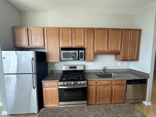 kitchen featuring stainless steel appliances and sink