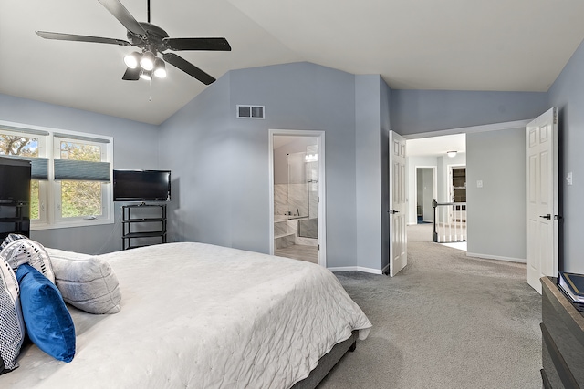 bedroom featuring connected bathroom, carpet, lofted ceiling, and ceiling fan