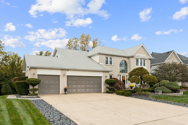 front of property with a garage