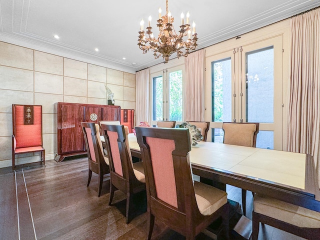 dining space with ornamental molding, recessed lighting, french doors, an inviting chandelier, and dark wood-style floors