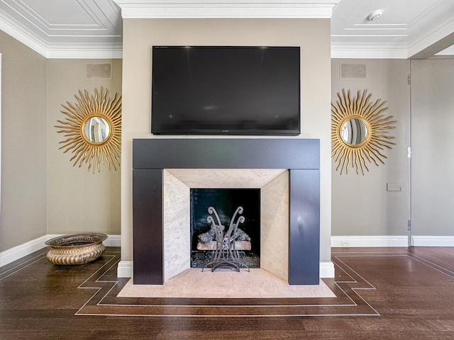 room details with baseboards, wood finished floors, a high end fireplace, and crown molding