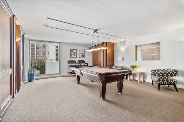 recreation room with expansive windows, light colored carpet, billiards, and baseboards