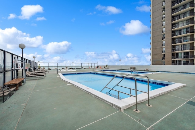 community pool featuring a patio