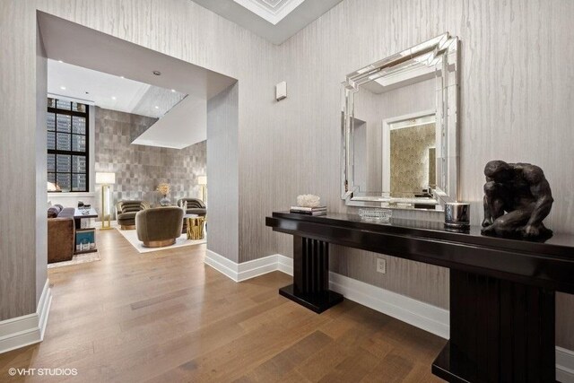 corridor featuring hardwood / wood-style floors