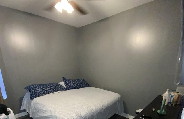6639 S Rhodes Ave, Chicago, IL 60637 - bedroom featuring baseboards and ceiling fan