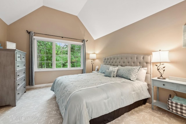 bedroom featuring vaulted ceiling