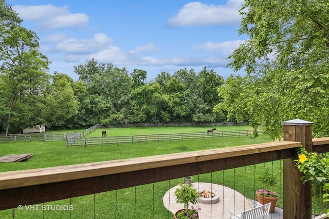 exterior space with a patio area and a rural view