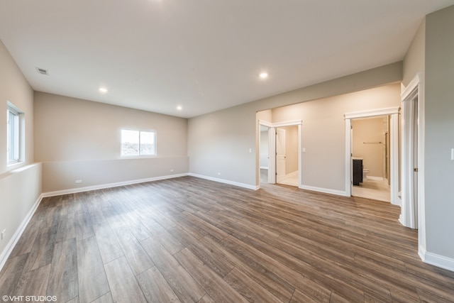 empty room featuring dark hardwood / wood-style floors