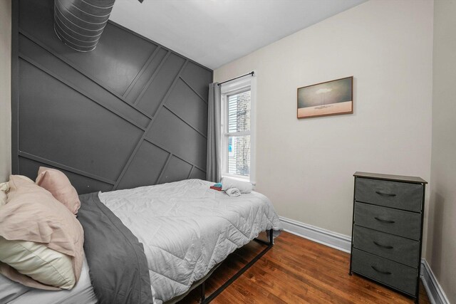 bedroom featuring hardwood / wood-style flooring