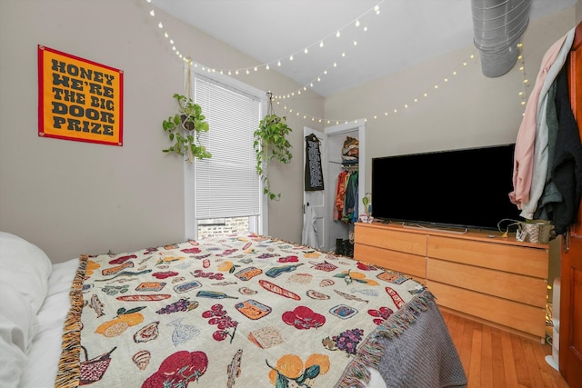 bedroom featuring hardwood / wood-style floors