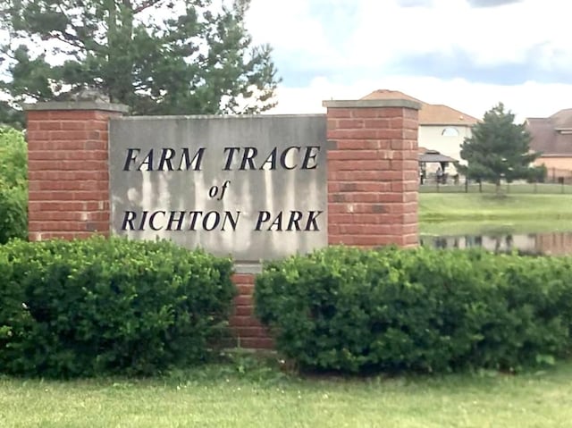 view of community sign