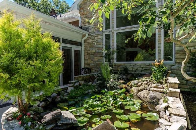 view of property exterior featuring stone siding