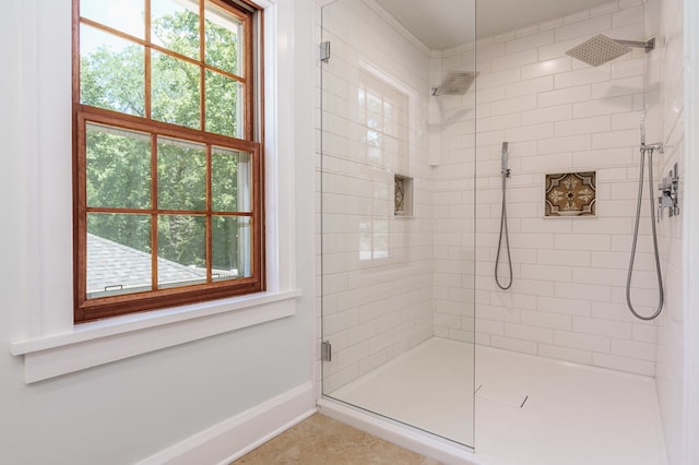 bathroom featuring tile patterned flooring and walk in shower