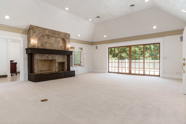 unfurnished living room with a stone fireplace, ornamental molding, high vaulted ceiling, and light colored carpet