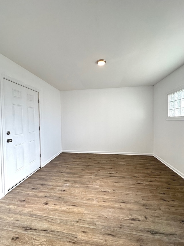 unfurnished room featuring hardwood / wood-style floors