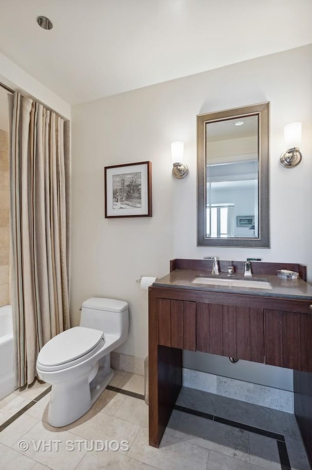 full bathroom with tile patterned flooring, vanity, shower / bath combination with curtain, and toilet