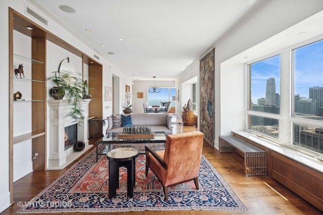 dining area with hardwood / wood-style flooring and a healthy amount of sunlight