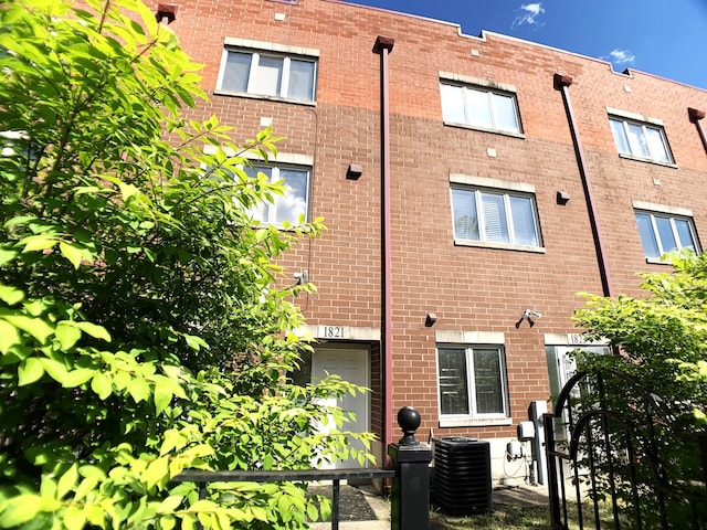 view of building exterior featuring central AC unit