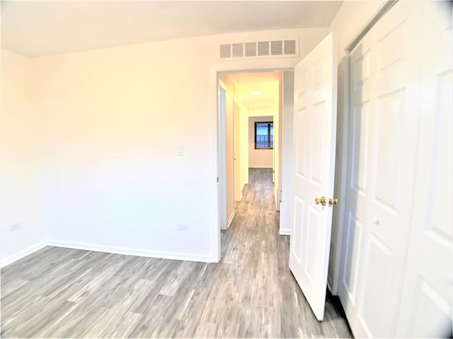 interior space with hardwood / wood-style flooring