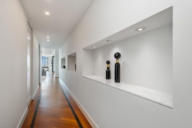 hallway featuring hardwood / wood-style floors