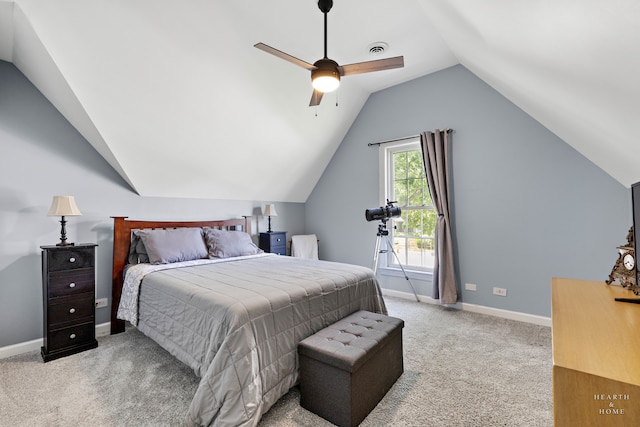 carpeted bedroom featuring lofted ceiling and ceiling fan