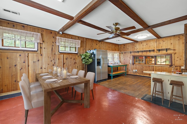 dining room with coffered ceiling, dark hardwood / wood-style floors, beamed ceiling, and ceiling fan