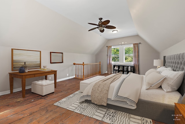 bedroom featuring vaulted ceiling, dark hardwood / wood-style flooring, and ceiling fan