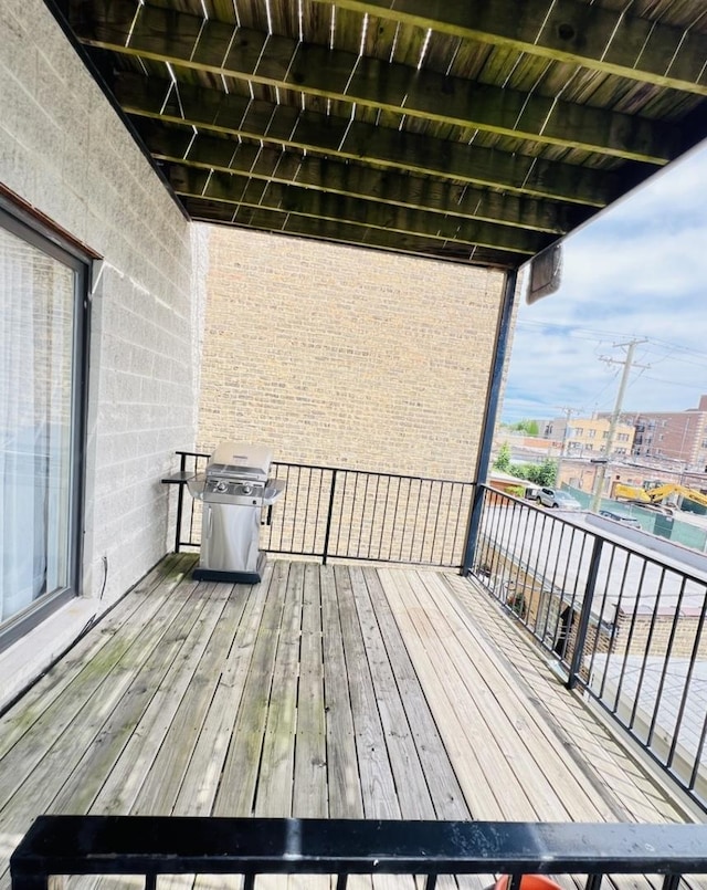 wooden terrace with grilling area