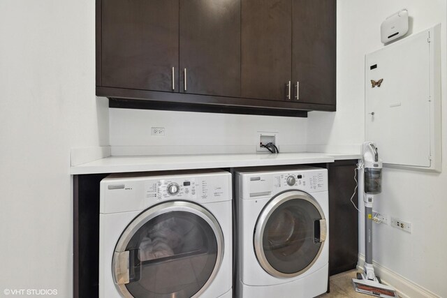 laundry area with cabinets and independent washer and dryer