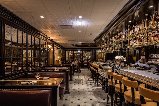 interior space with carpet floors and indoor bar