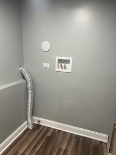 laundry area featuring washer hookup and dark wood-type flooring