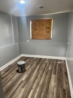 spare room featuring hardwood / wood-style floors