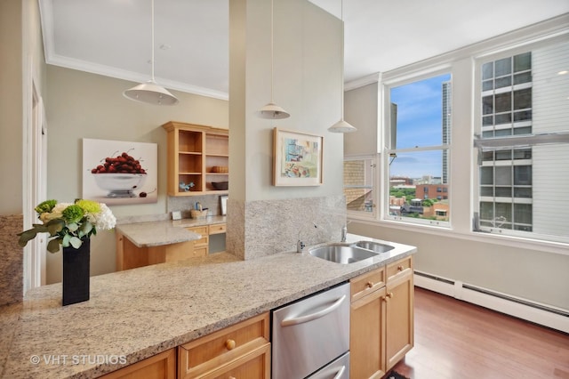 kitchen with crown molding, hanging light fixtures, baseboard heating, a sink, and dishwasher