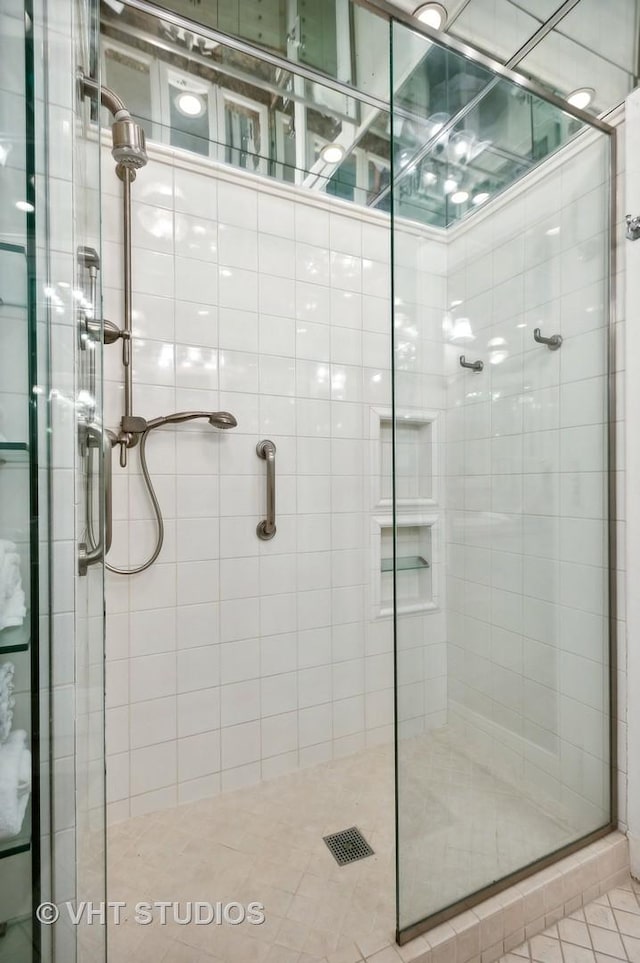 bathroom featuring a shower stall