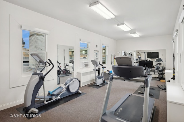 exercise room featuring carpet