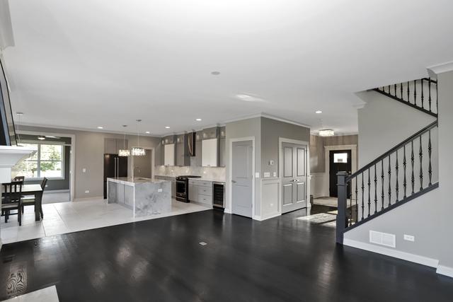 living room with stairway, baseboards, recessed lighting, wine cooler, and light wood-style floors