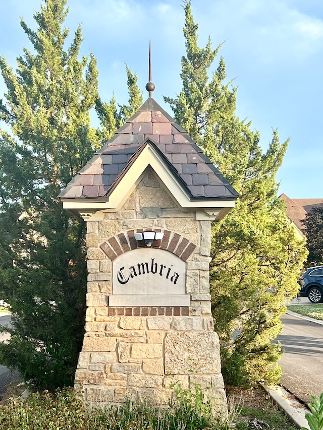 view of community sign