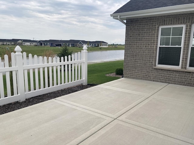 view of patio / terrace with a water view