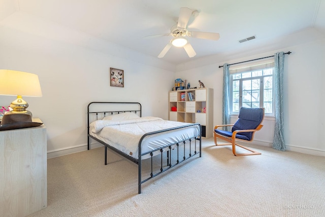 bedroom with light carpet and ceiling fan