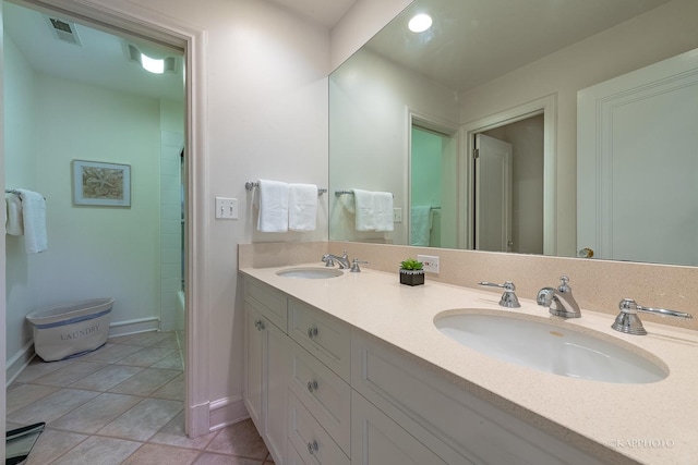 bathroom featuring vanity and  shower combination