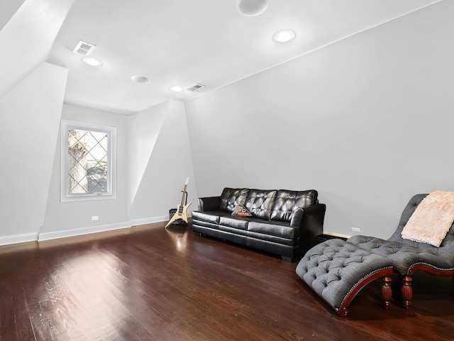 sitting room featuring baseboards, visible vents, wood finished floors, and recessed lighting