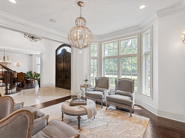 living room featuring an inviting chandelier and plenty of natural light