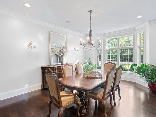 dining room featuring dark wood-style floors, a chandelier, crown molding, and baseboards