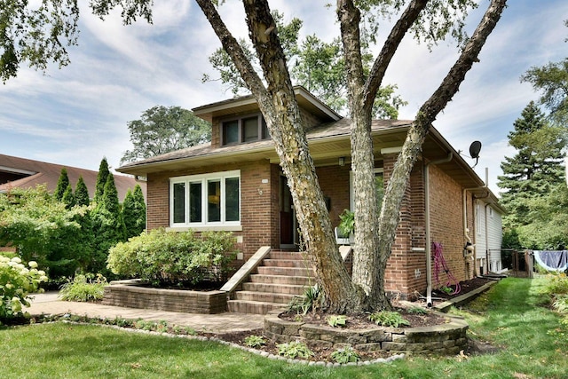 view of front of home with a front yard