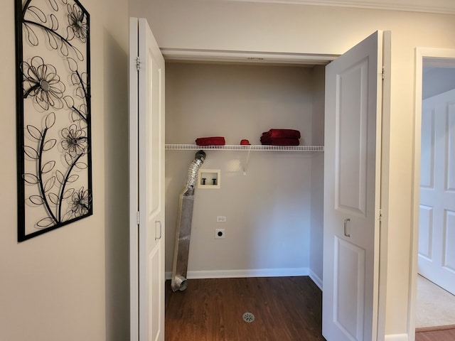 washroom with dark hardwood / wood-style floors, hookup for an electric dryer, and washer hookup