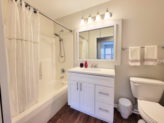 full bathroom featuring shower / tub combo, wood-type flooring, toilet, and vanity