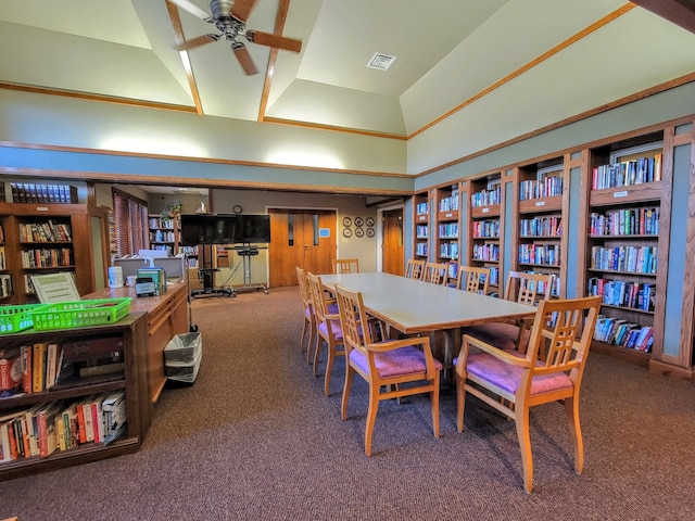 dining area with carpet and ceiling fan