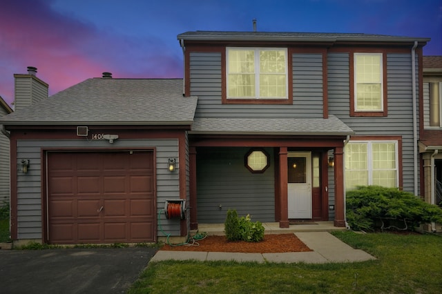 1406 Trescott St, Mundelein, IL 60060 - view of front facade with driveway, a garage, and roof with shingles