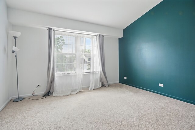 1406 Trescott St, Mundelein, IL 60060 - empty room with carpet flooring and baseboards