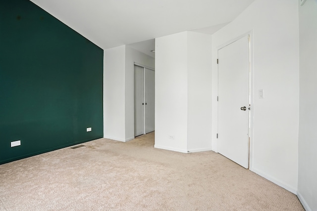1406 Trescott St, Mundelein, IL 60060 - unfurnished bedroom featuring carpet flooring, baseboards, and a closet